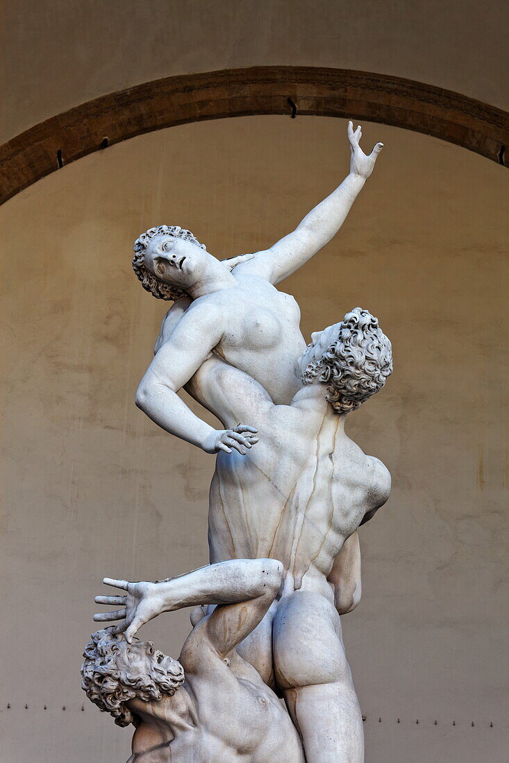 Statue Rape of the Sabine women by Giambologna in Loggia dei Lanzi, Piazza della Signoria, Florence, Tuscany, Italy