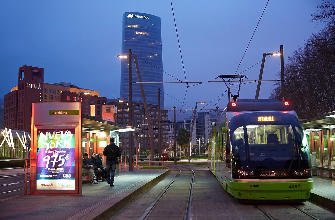 Urban tramway, Abandoibarra, Iberdrola tower, Bilbao, Bizkaia, Basque Country, Spain.