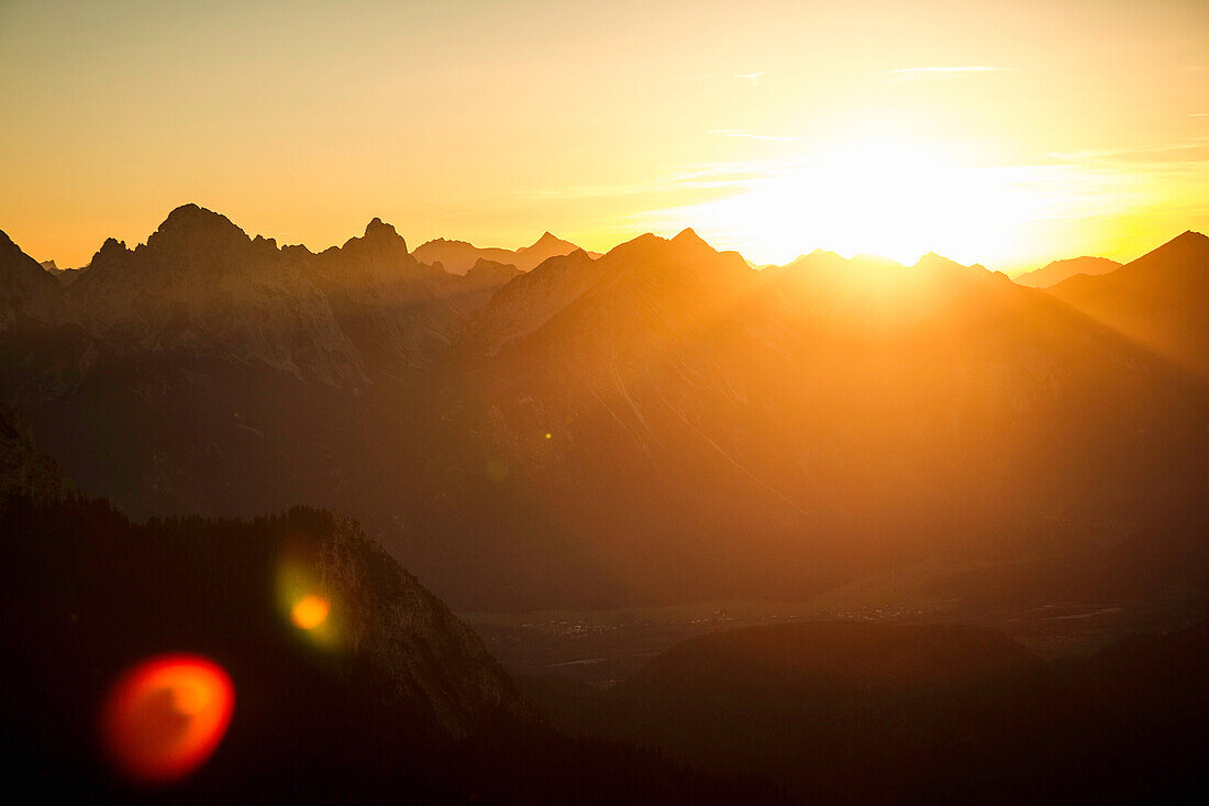 Silhouette of mountains at sunset. Branderschrofen, Tegelberg