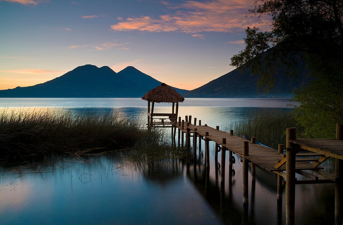 Wooden pier in still lake