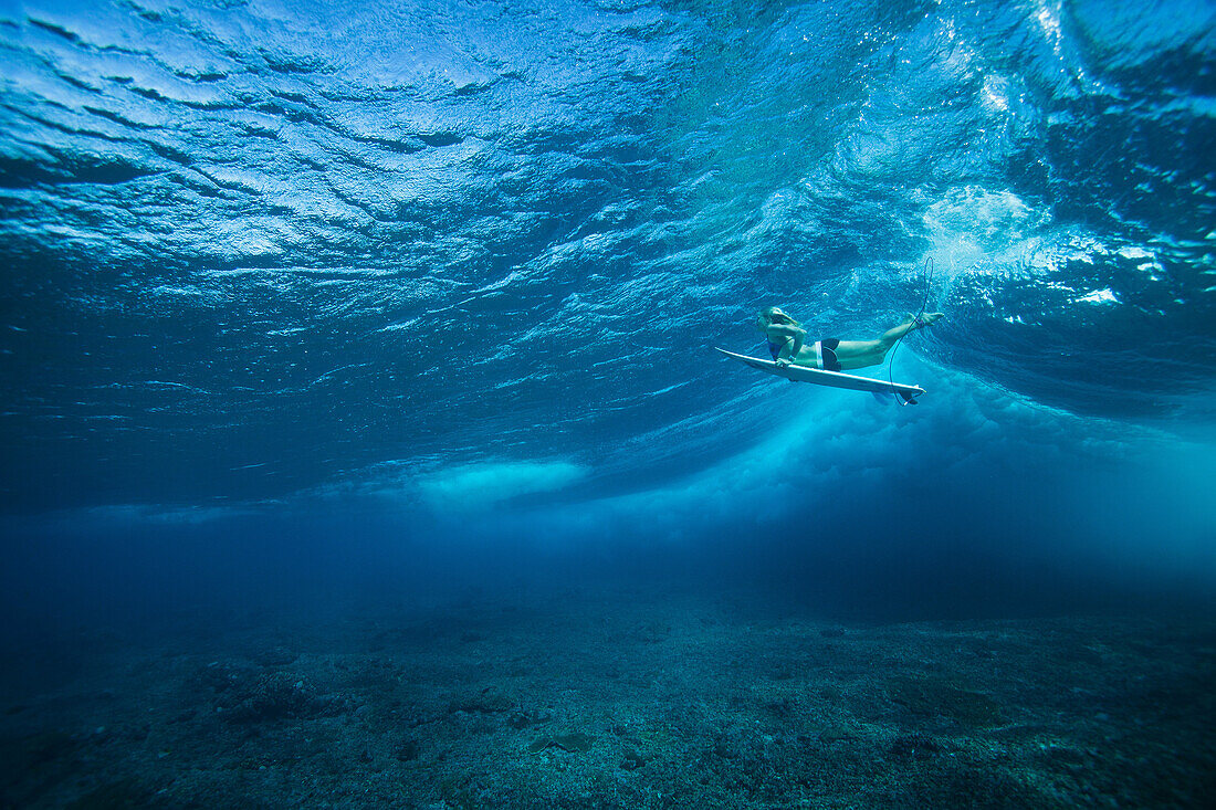 Underwater view of surfer in waves