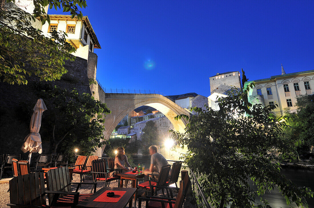 Restaurant at the old bridge at night, Mostar, Bosnia and Herzegovina