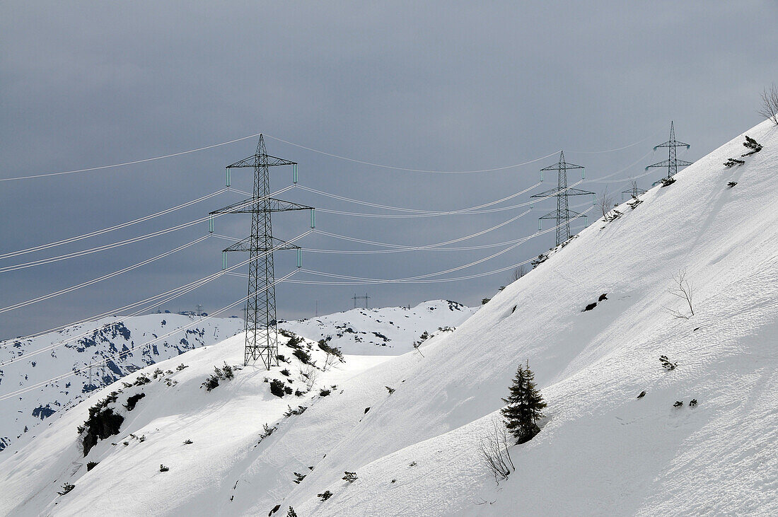 Large overhead power cable over Stuben am Arlberg in Winter, Tyrol, Austria