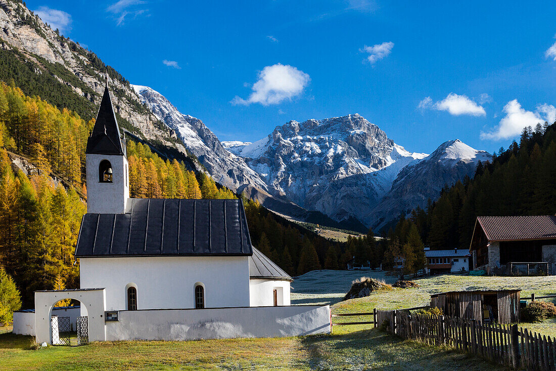 Reformed Church of S-charl in autumn, Scuol, Engadin, Canton of Grisons, Siwtzerland
