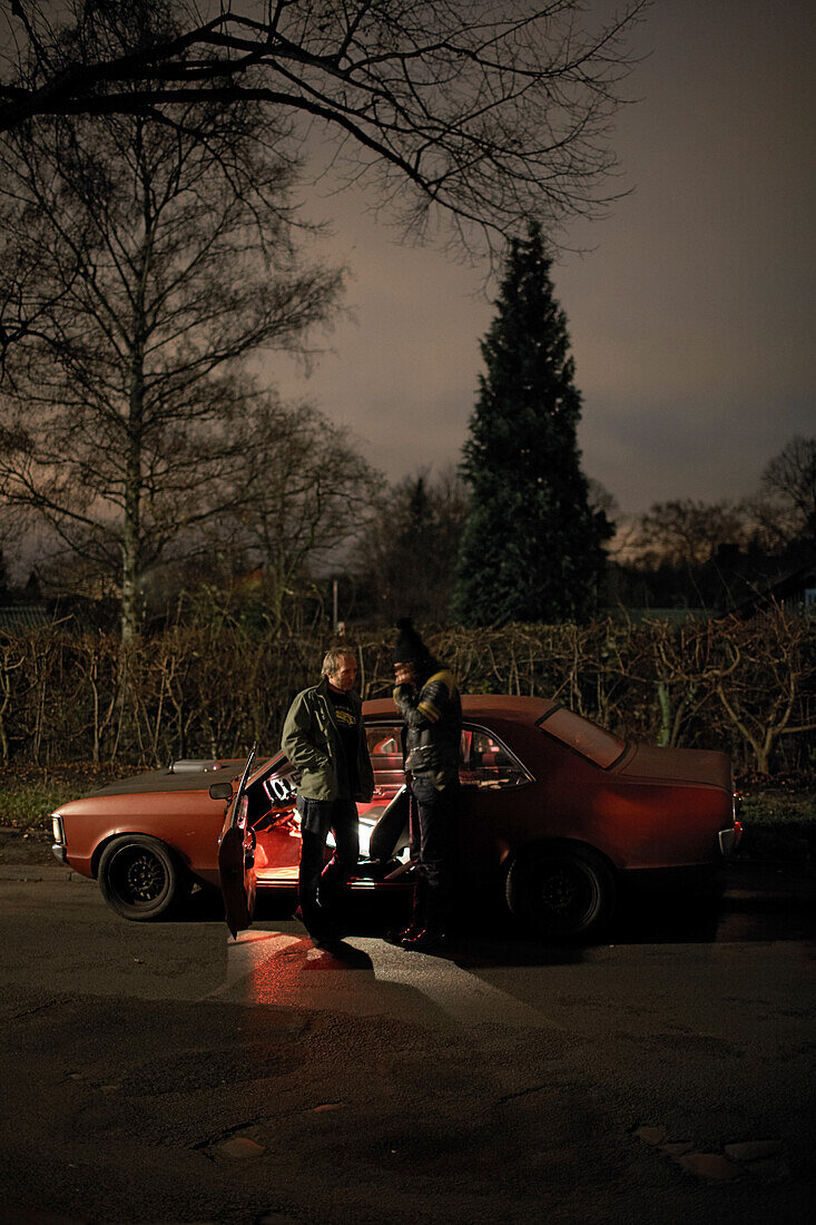 Two men near a modern classic car, Motoraver group, Hamburg, Germany