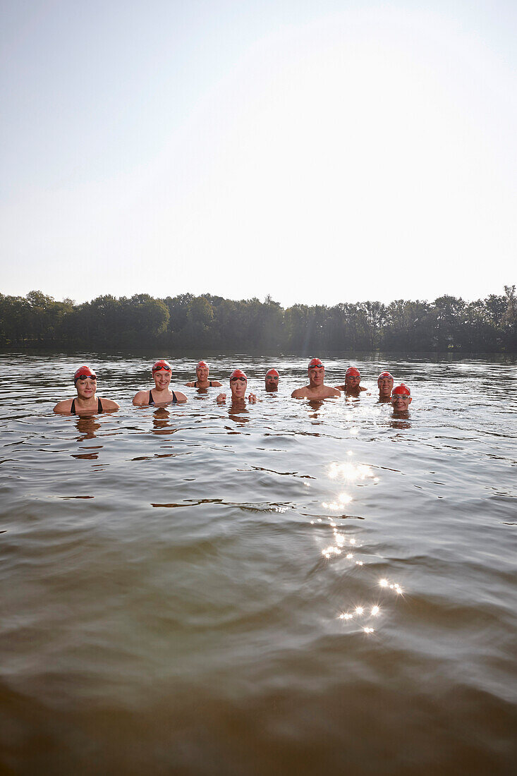 Competitive swimmers training in open water, Boberg swimming lake, Billwerder, Hamburg, Germany