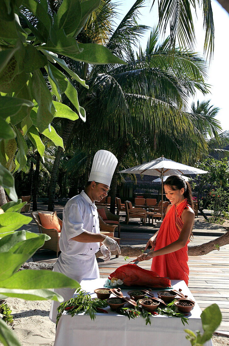 Republic of the Maldives, Lhaviyani Atoll,  Kanuhura Hotel, Chef and young woman