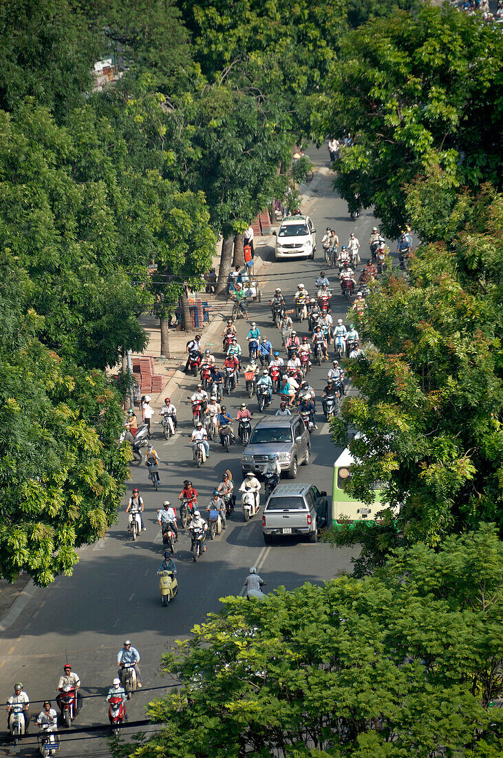 Socialist Republic of Vietnam, Southern Vietnam, Ho Chi Minh City, Mopeds and scooters in a street