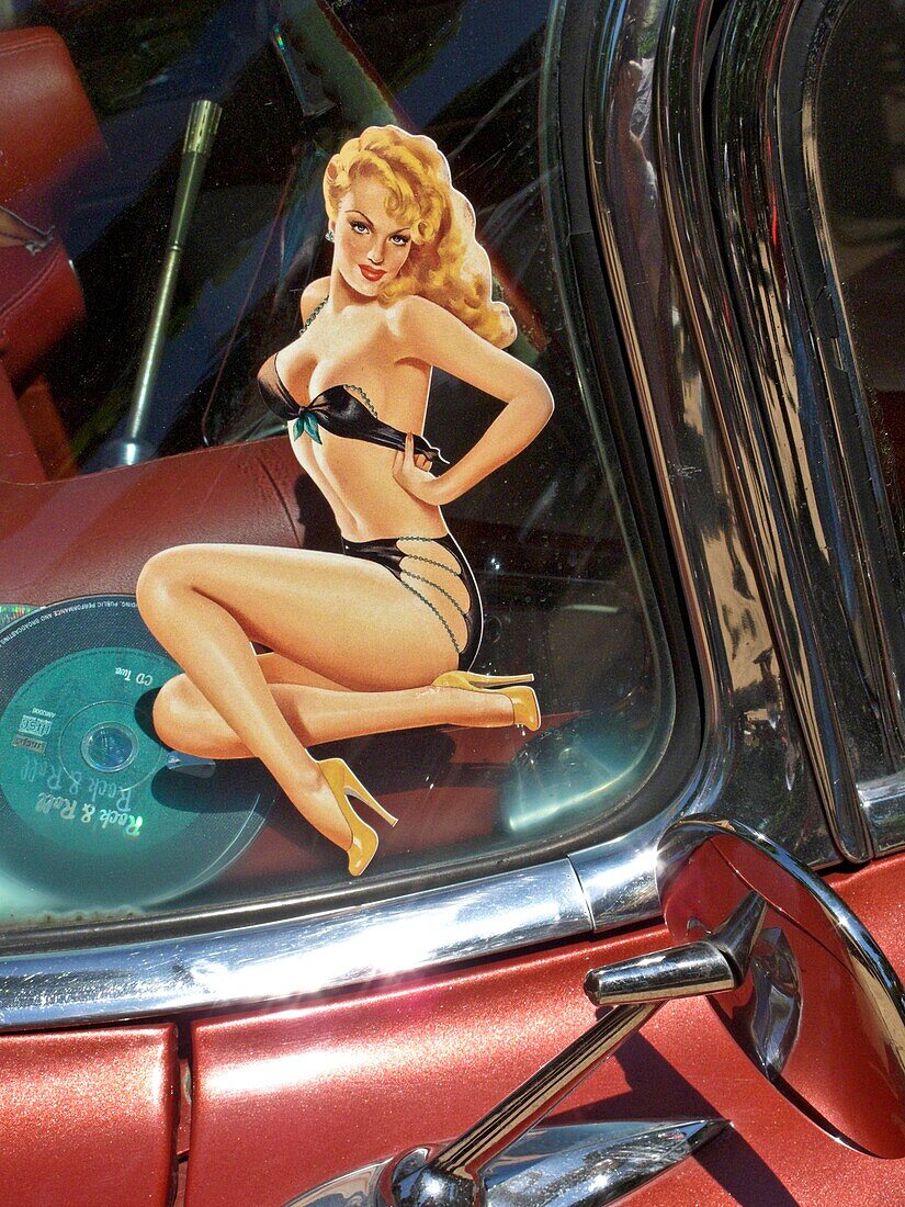 France, Vichy, retro pin-up girl sticker on a cadillac windscreen