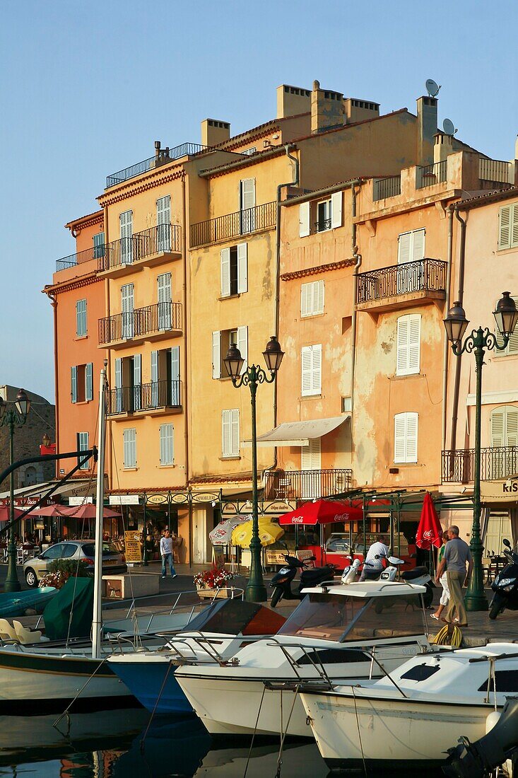 France, Provence, St Tropez, Marina, View of ochre buildings and boats