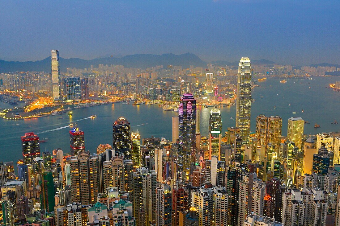 Hong Kong City. Sunset from Victoria Peak, Hong Kong Island and Kowloon, Financial Center Bldg.
