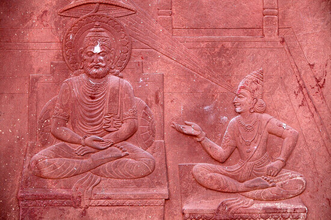 Bhagavad Gita engraved on a Hindu temple : dialogue between Krishna and Arjuna Vrindavan. India.