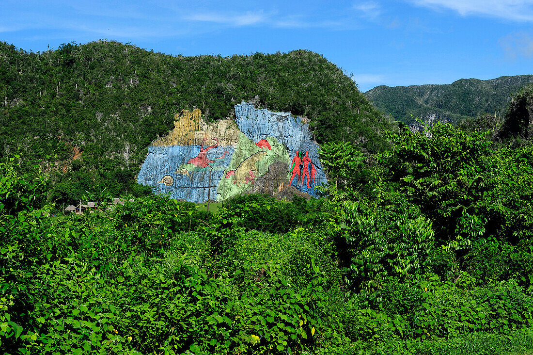 The Mural de la Prehistoria painted in 1961 by Leovigildo Gonzalez in Vinales Valley, Cuba