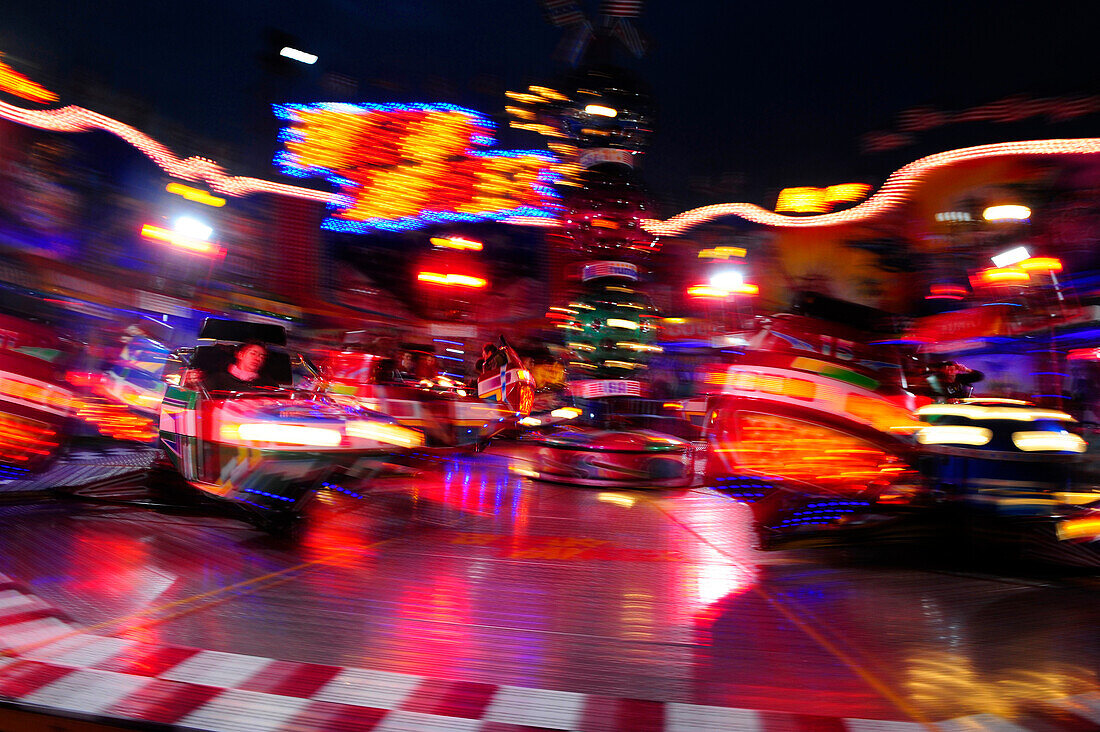 Carousel at  the Oktoberfest in Munich, the world's largest fair, by night, Germany