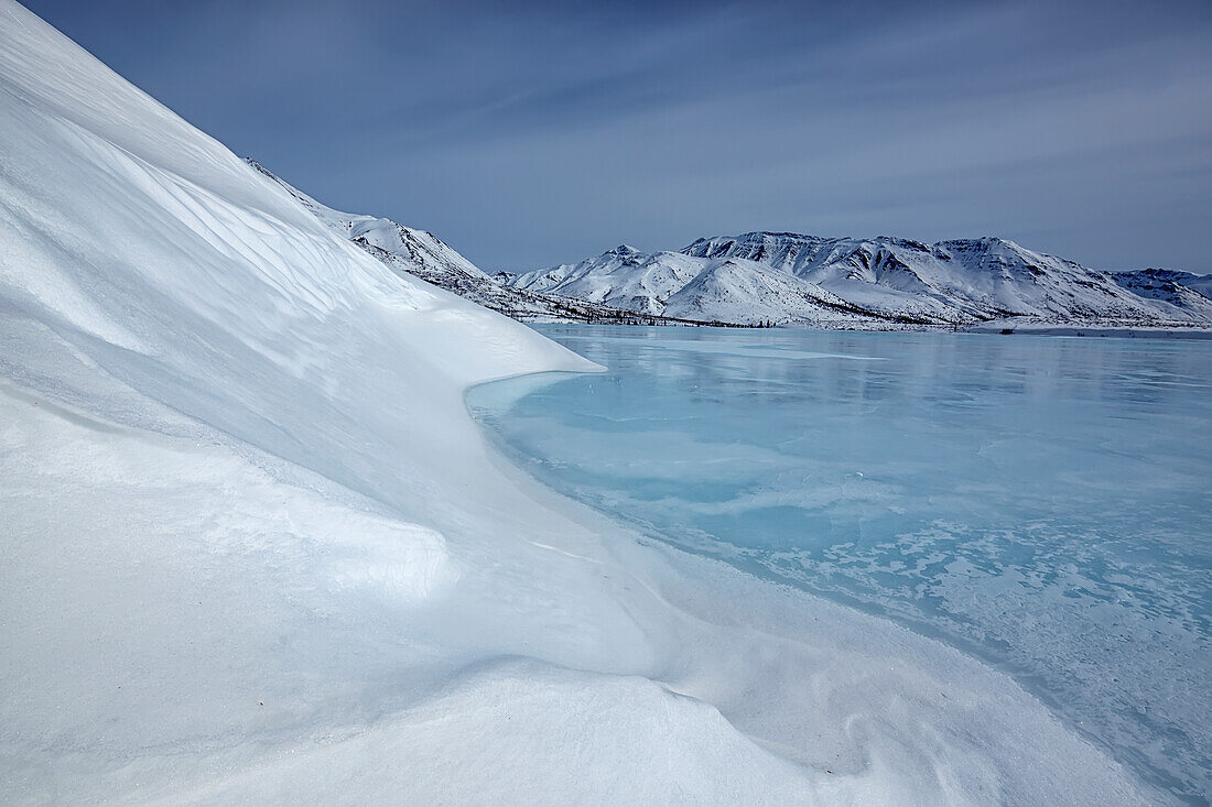 The frozen klondike river along the dempster highway in tombstone territorial park, yukon canada