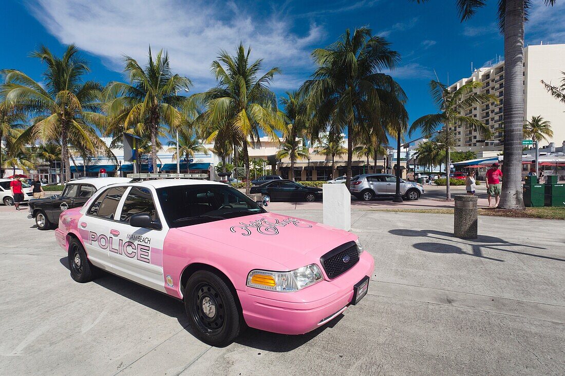 USA, Miami Beach, South Beach, Old Miami Beach City Hall with old and new police cars
