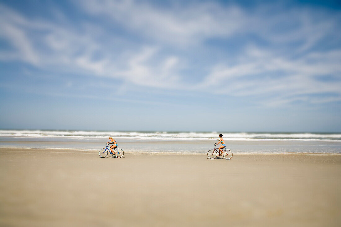 Women Biking on Beach