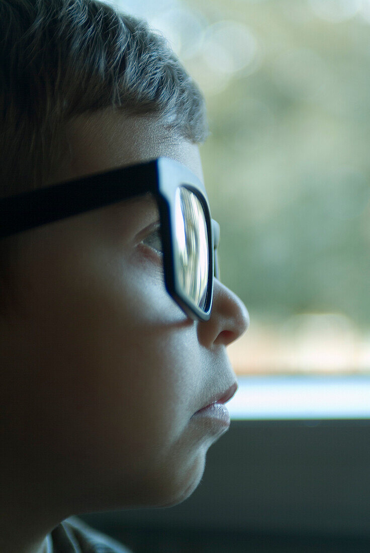 Close-up of Boy Wearing Glasses
