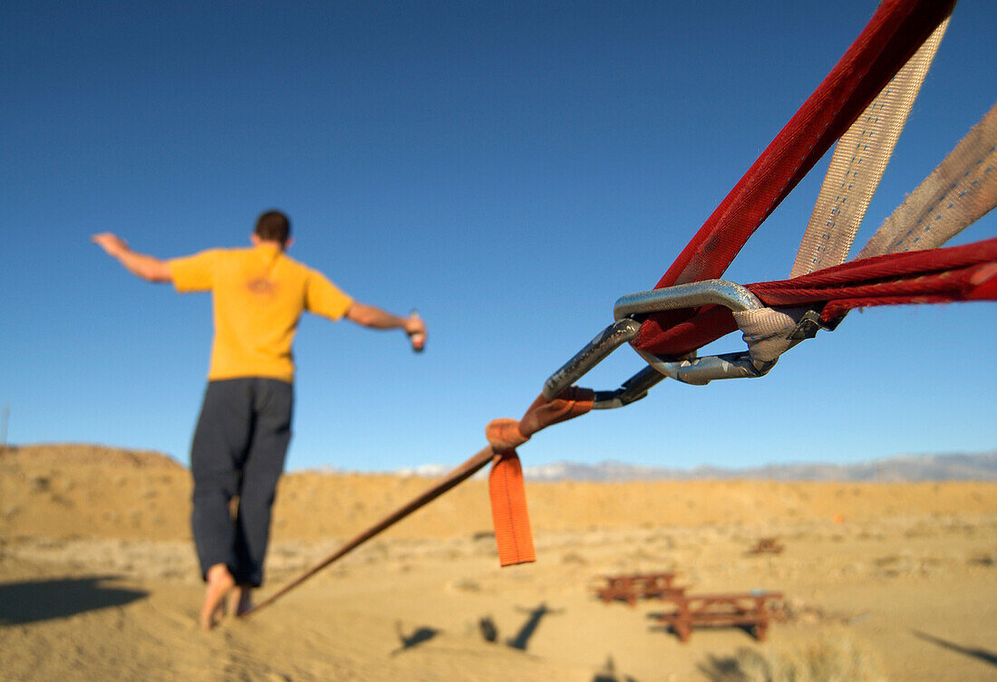 Man balancing on a tightrope.