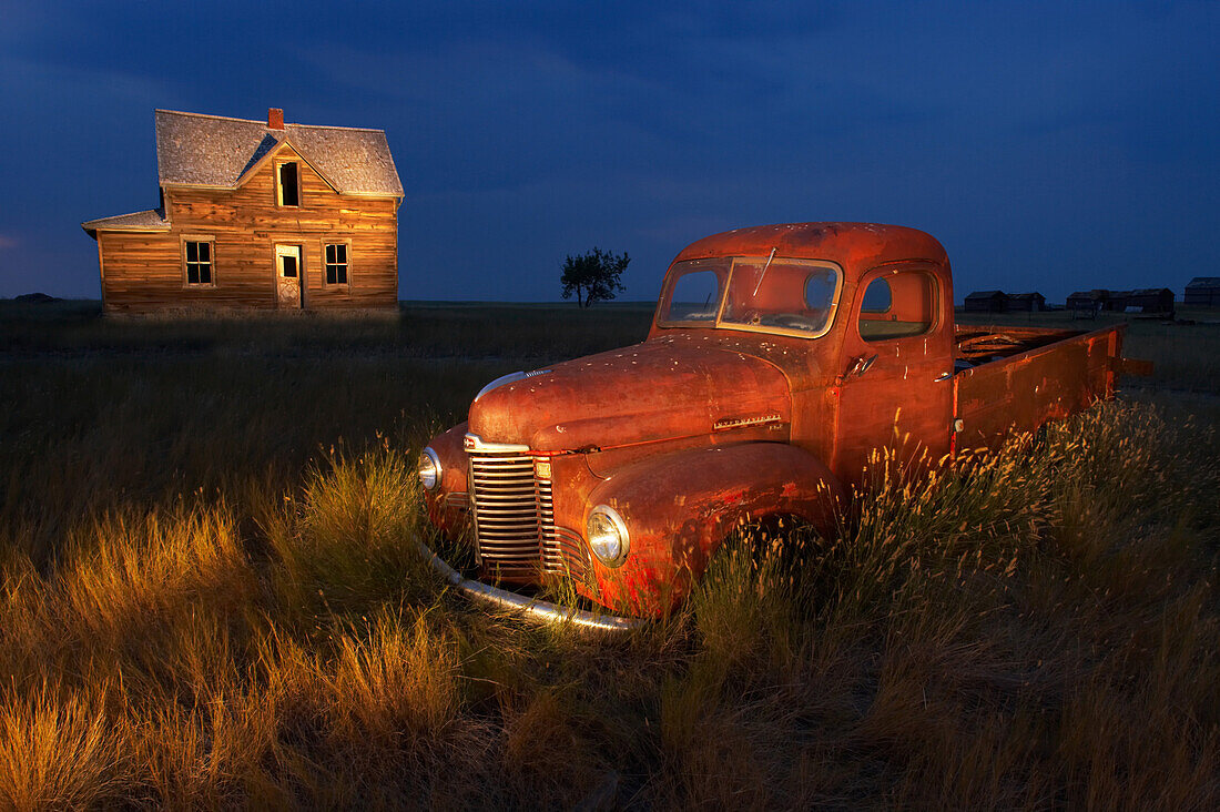 Abandoned Farm House and Old Red Pick-up Truck at Night Painted in Light, Southwestern Saskatchewan