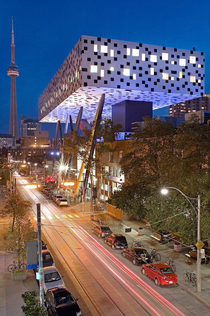 Ontario College of Art and Design with the CN Tower in the background at Night, Toronto, Ontario
