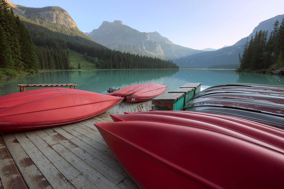 Red canoes on a dock, Emerald Lake, Yoho National Park, British Columbia