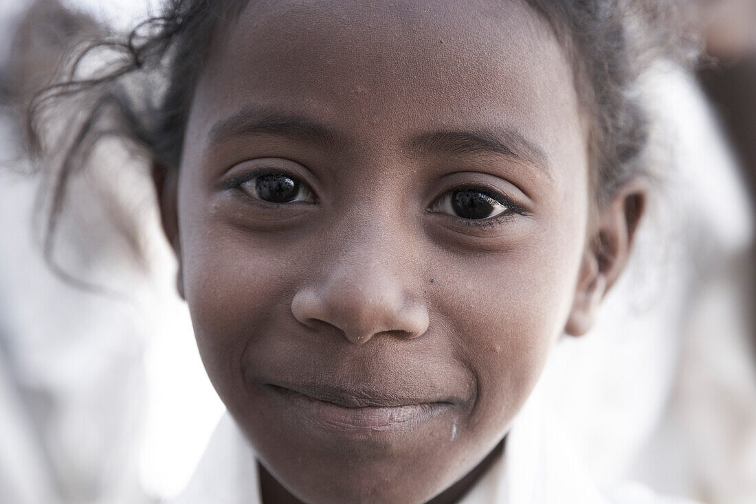 Schoolgirl smiling at camera, Dongola, Northern, Sudan
