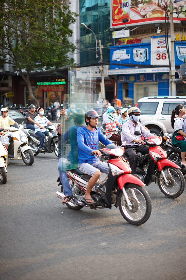 Scooterists on the way, Ho-Chi-Minh City, Vietnam