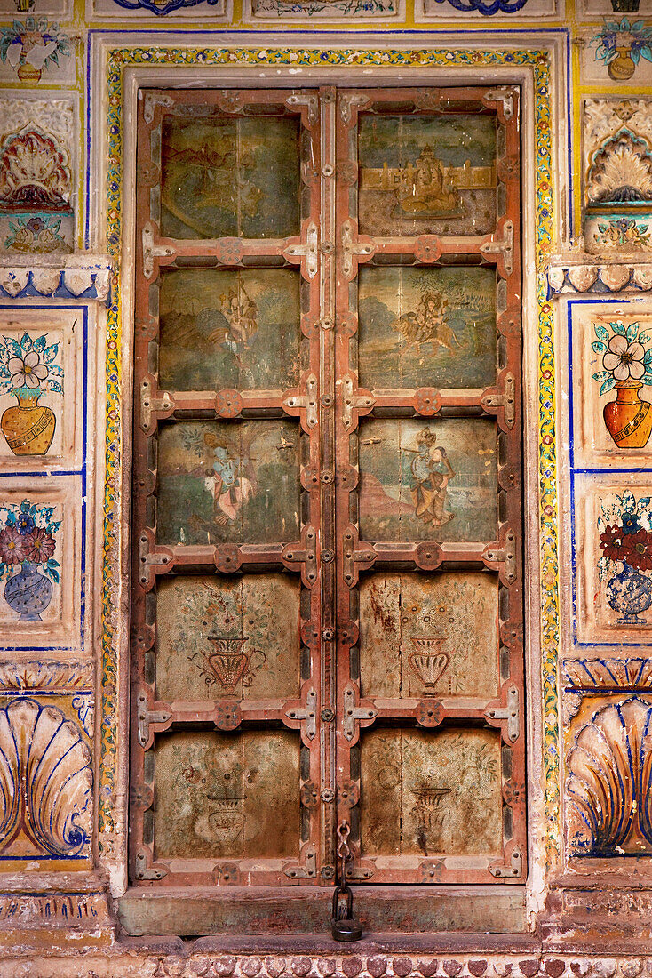 Ancient ornated wooden portal inside Mehrangarh Fort, Jodhpur, Rajasthan, India
