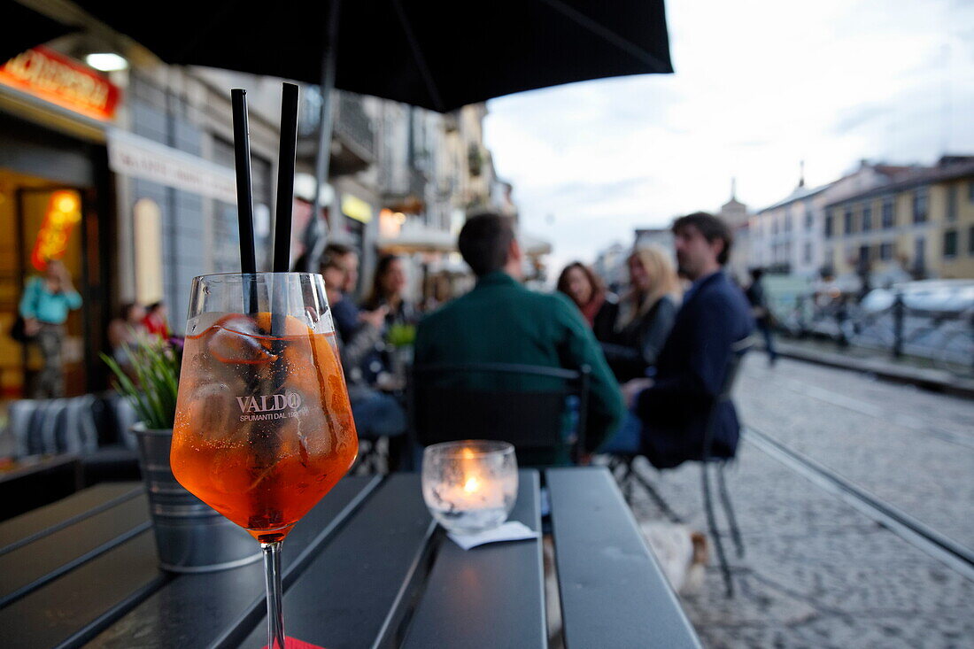 Aperitive served in a bar, Navigli quarter, Milan, Lombardy, Italy