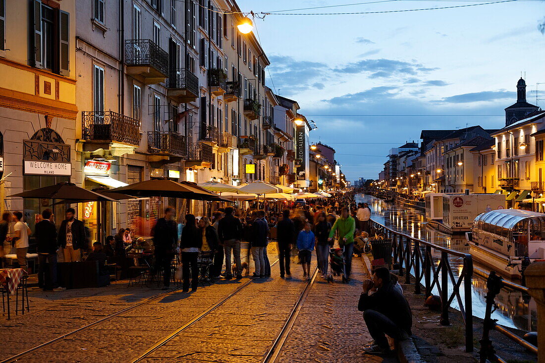 Restaurants and bars along a canal in the evening, Navigli quarter, Milan, Lombardy, Italy