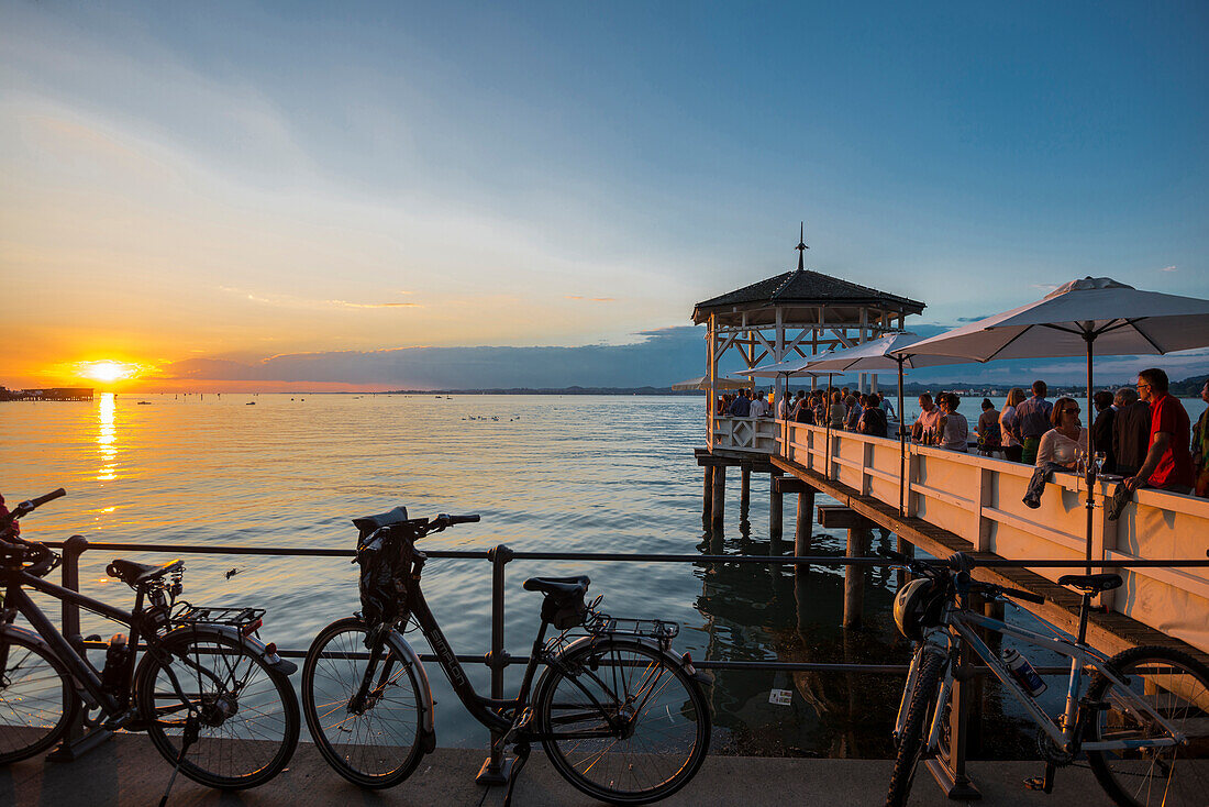 Pavilion with bar on the shore of Lake Constance at sunset, Bregenz, Vorarlberg, Austria