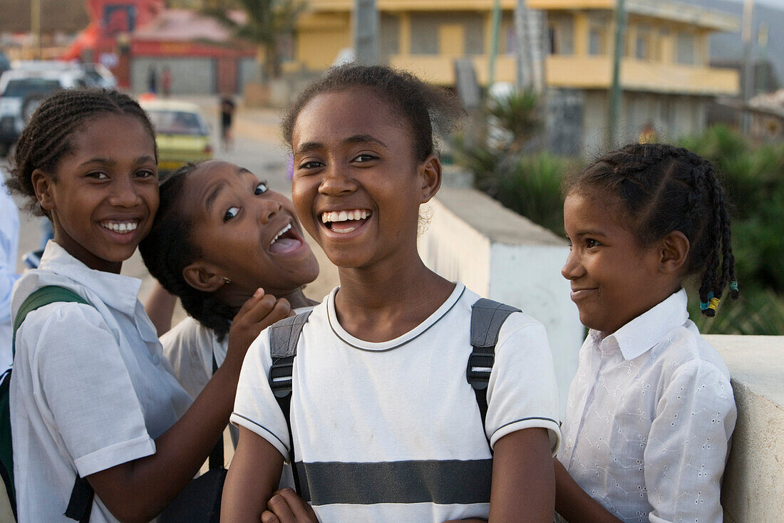 Cheerful girls in school uniform on the way home from school, Taolanaro (Fort Dauphin), Toliara, Madagascar, Indian Ocean