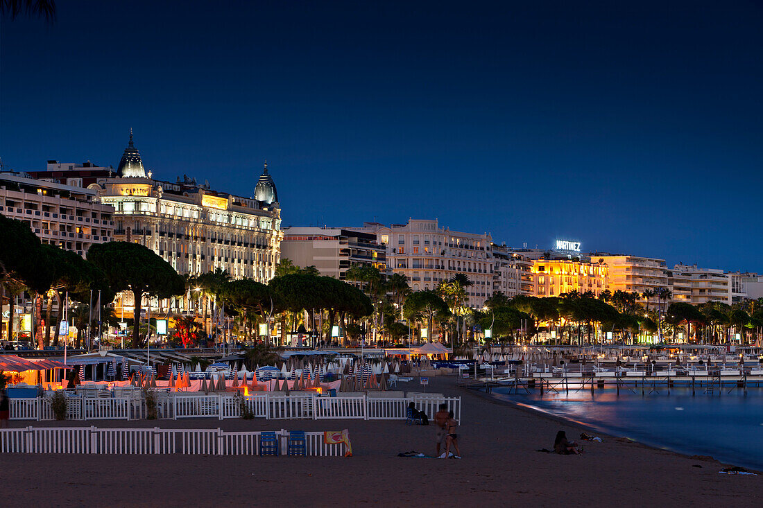 Luxury hotels and beach at dusk, Cannes, Provence, France