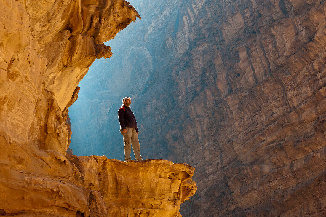 Local Guide Enjoying The View In Wadi Rum (The Valley Of The Moon), Jordan, Middle East