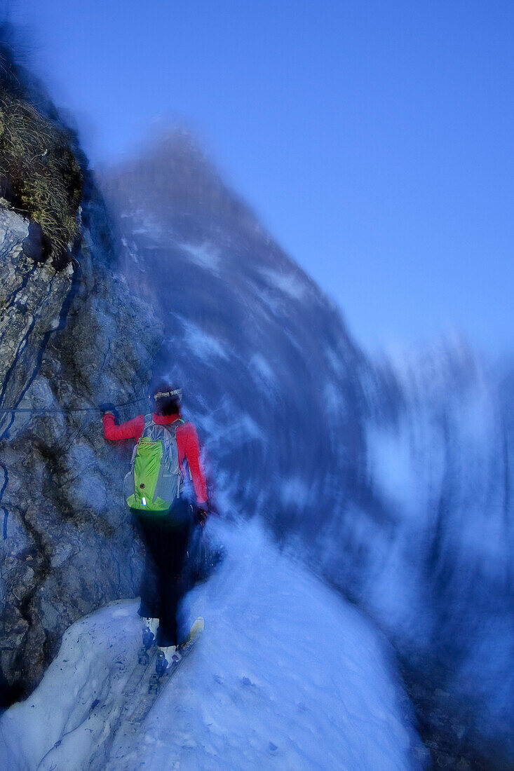 Female backcountry skier ascending to Trischubel pass, Wimbachgries, Berchtesgaden Alps, Berchtesgaden Nationl Park, Upper Bavaria, Bavaria, Germany