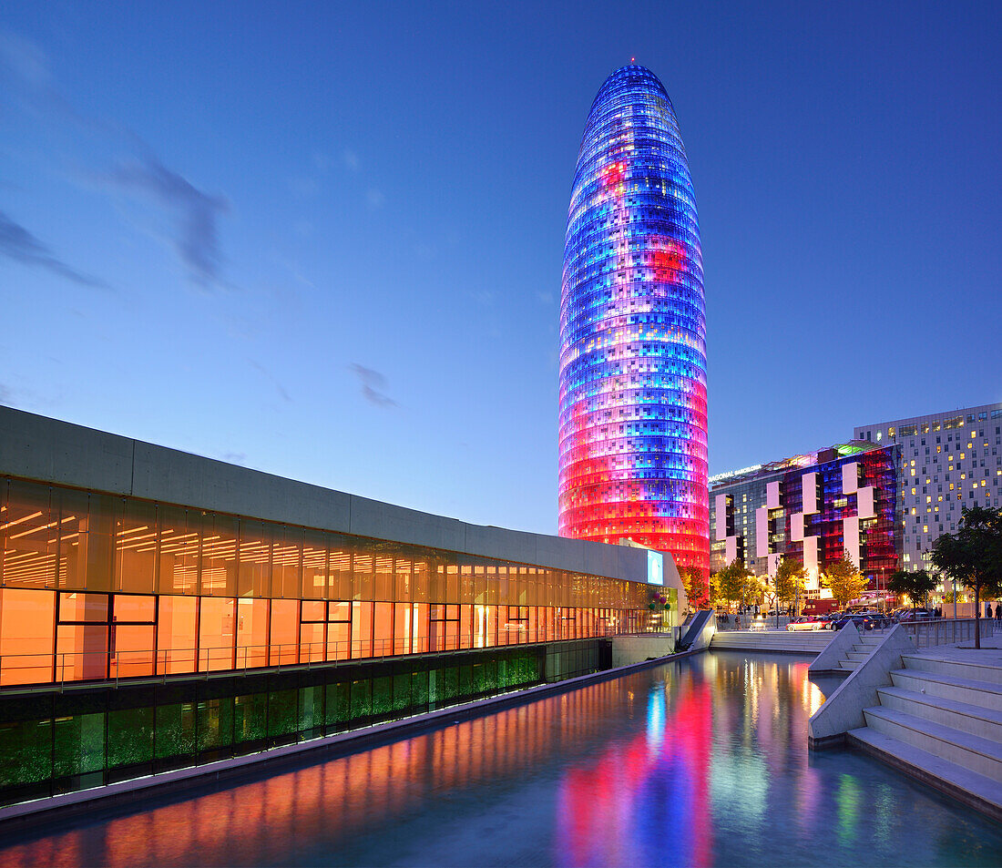 Disseny Hub Barcelona and skyscraper Torre Agbar, illuminated, architect Jean Nouvel, Barcelona, Catalonia, Spain