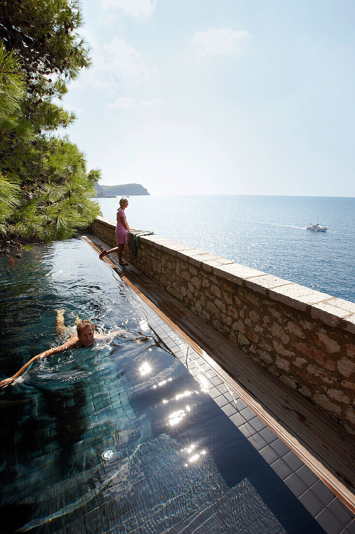 Man swimming in the Cliff Pool, Aman Sveti Stefan, Sveti Stefan, Budva, Montenegro