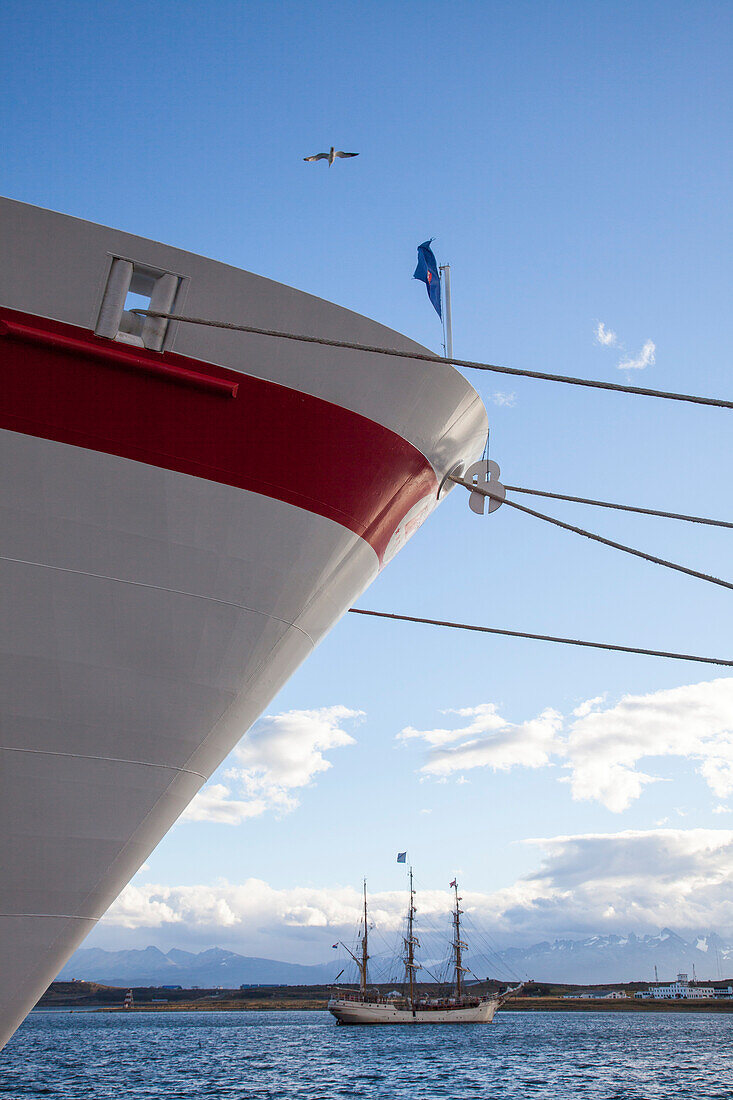 Bow of cruise ship MS Deutschland (Reederei Peter Deilmann) and sailing ship SV Europa in the harbor, Ushuaia, Tierra del Fuego, Patagonia, Argentina