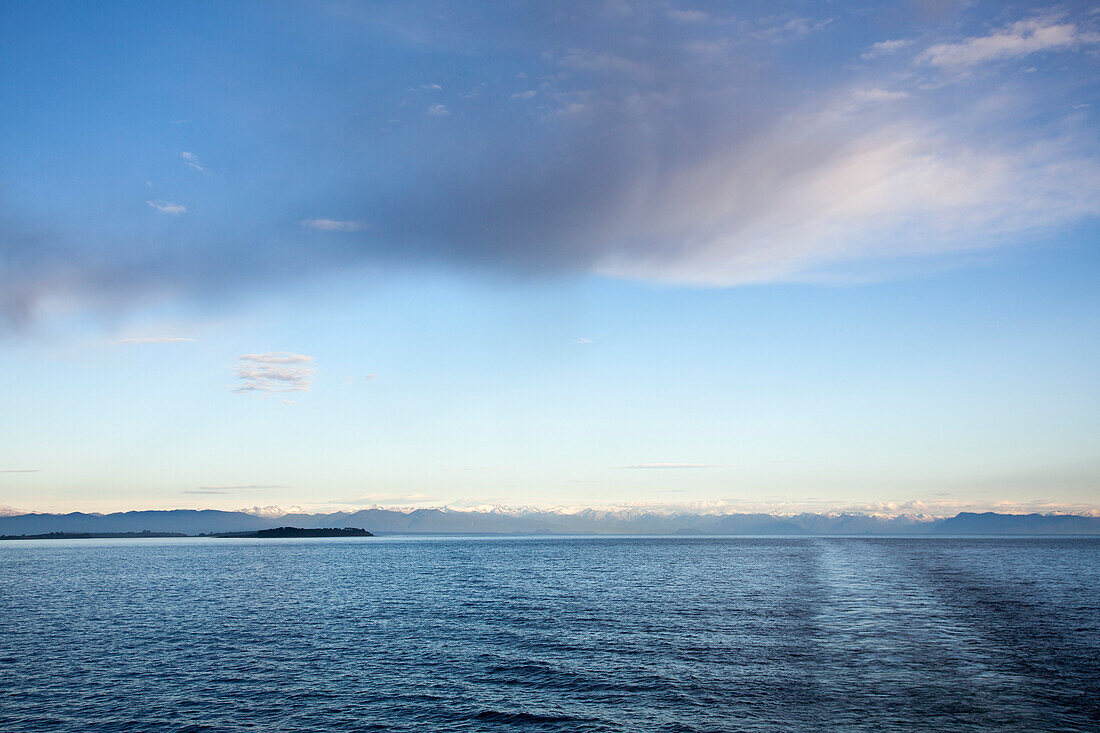 Cloud, coastline and mountains near Puerto Montt, Los Lagos, Patagonia, Chile