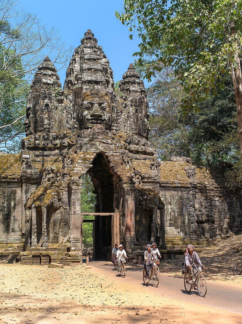 Angkor Thom, located in present day Cambodia, was the last and most enduring capital city of the Khmer empire. It was established in the late twelfth century by king Jayavarman VII. It covers an area of 9 km², within which are located several monuments fr