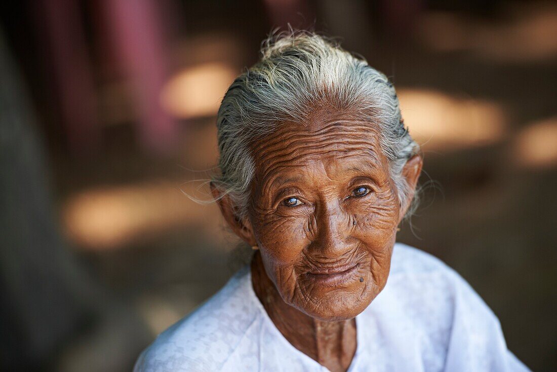 Portrait of an elderly burmese woman  Kyauktan town  Thanlyin District, Yangon Division  Myanmar