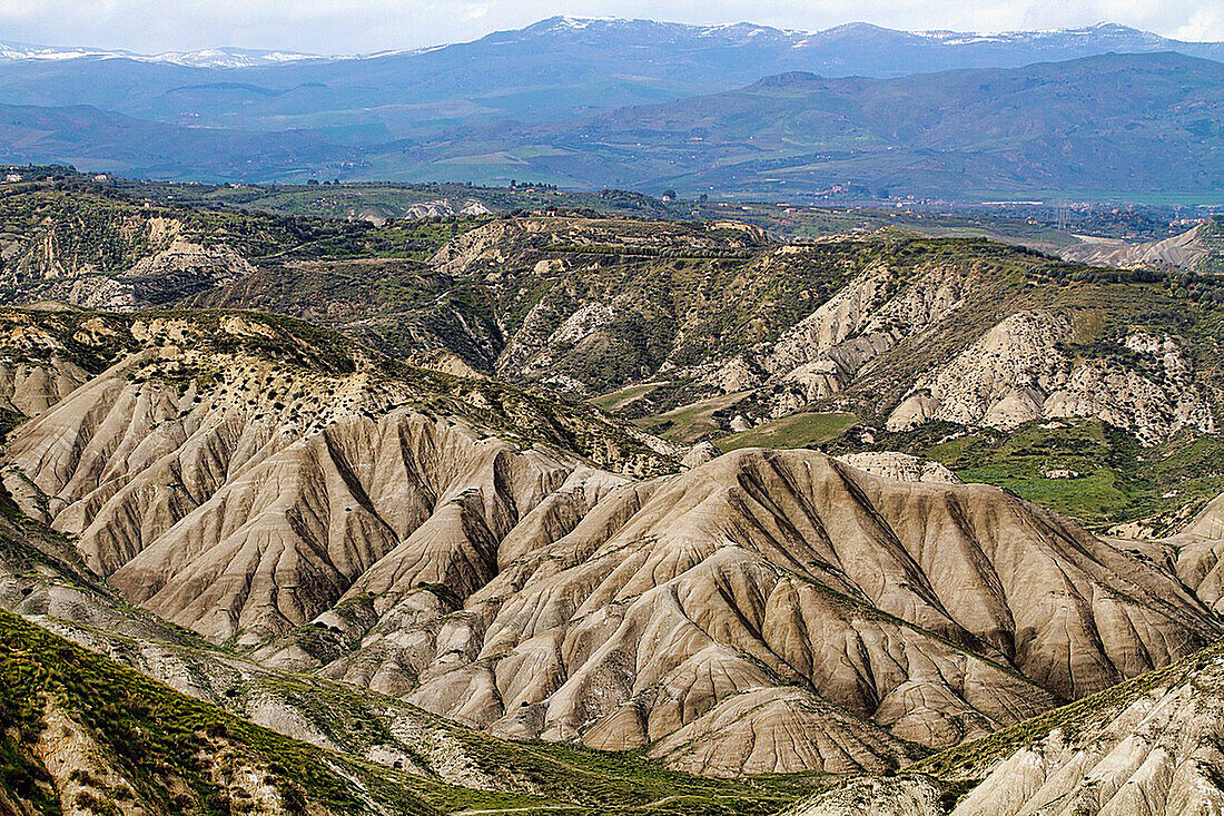 Calanchi del Cannizzola, a geological formation known as Badlands where softer sedimentary rocks and clay soils have been eroded by wind and water near Centuripe, Sicily, Italy