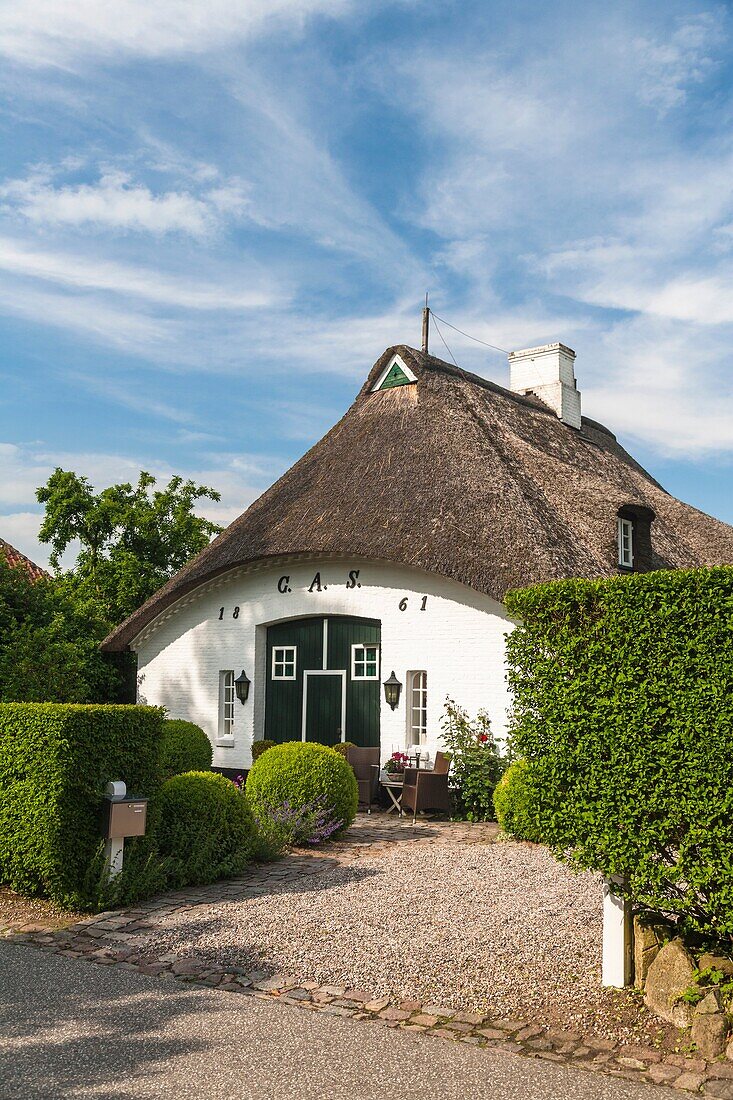 Traditional house with thatched roof in Sieseby, Schleswig-Holstein, Germany, Europe