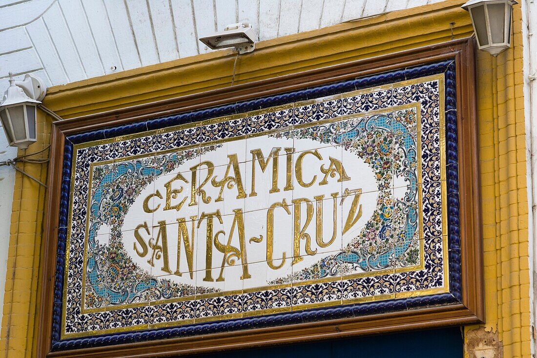 Tiled signboard of ceramic shop, Calle Mateos Gago, The Barrio de Santa Cruz, Seville, Sevilla, Andalusia, Spain