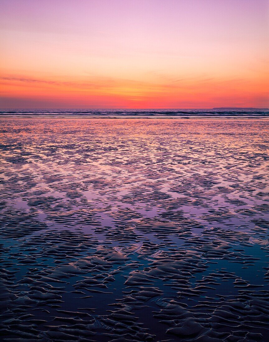 Dusk at Westward Ho! beach, North Devon, England.