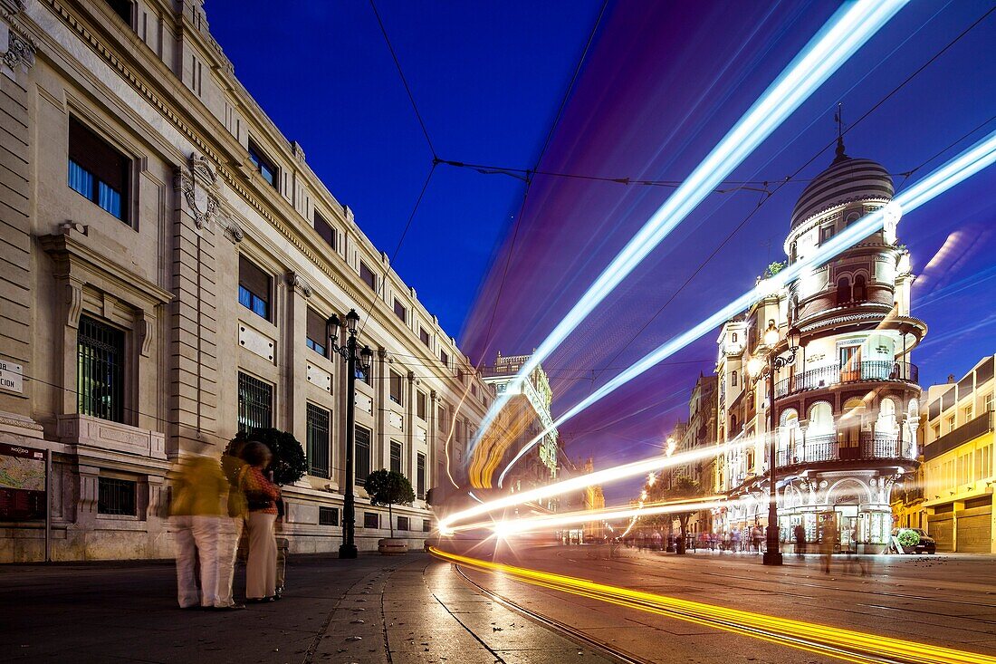 Light trails of a streetcar on Constitution Avenue, Seville, Spain