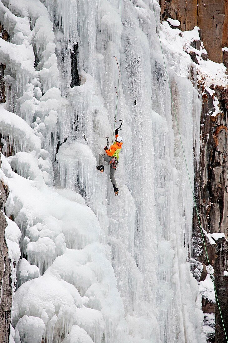 Elijah Weber ice climbing Palisade Falls which is rated WI-4 and located in Hyalite Canyon in the Gallatin Mountains near the city of Bozeman in southern Montana
