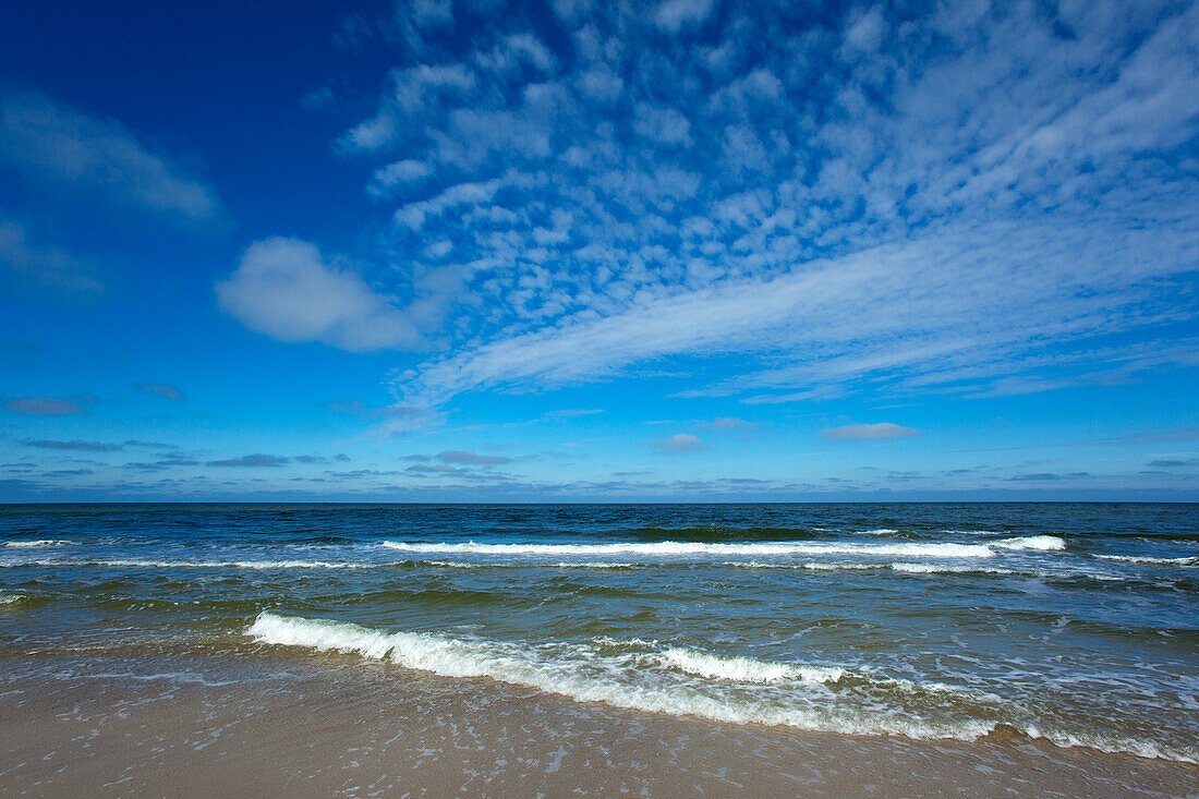 Clouds and waves on the beach near Kampen, Sylt island, North Sea, North Friesland, Schleswig-Holstein, Germany
