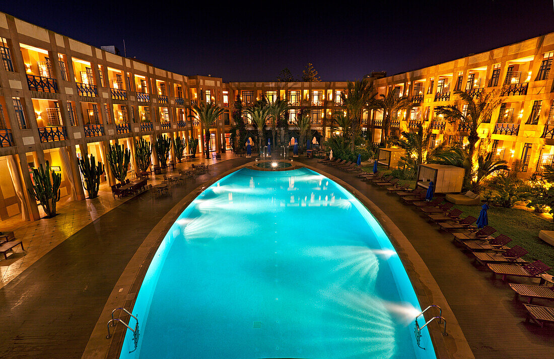 Outdoor pool at Sofitel Hotel at night, Essaouira, Morocco